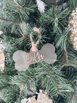 Frosted dog bone shaped bauble with cursive mirror name