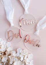 Frosted round bauble with cursive mirror name