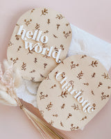 Oval baby announcement plaque with name - floral