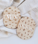 Oval baby announcement plaque with name - floral
