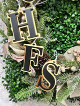 Natural burlap Christmas stocking with initial tag