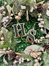 Natural burlap Christmas stocking with initial tag