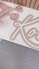 Double layered name plaque