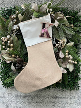 Natural burlap Christmas stocking with initial tag