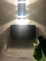 Matte black house address sign with stand-off mounts