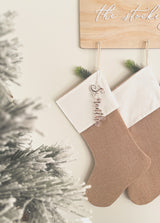 Natural burlap Christmas stocking with frosted name tag