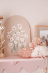 Arch plaque with printed daisy design