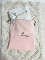 White cotton Santa sack with timber arch-shaped tag