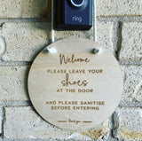 “Please leave shoes at the door” hanging plaque