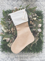 Natural burlap Christmas stocking with initial tag