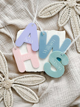 Acrylic letter initial bag tag with engraved name