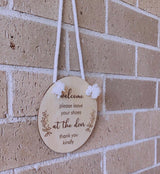 “Please leave shoes at the door” hanging plaque